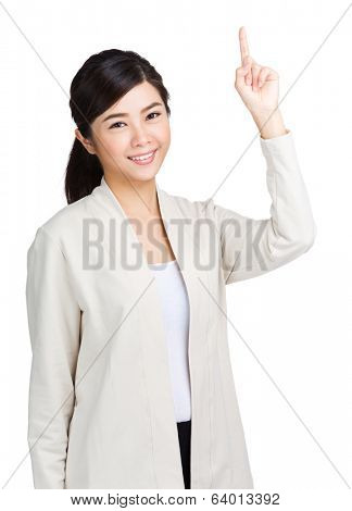 Young Asian woman pointing 