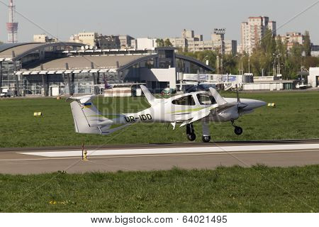 Diamond DA42 Twin Star business aircraft landing on the runway