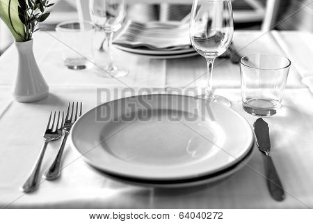 table setting in restaurant interior, desaturated
