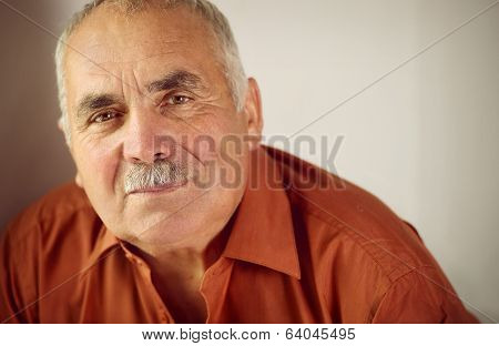 Friendly Senior Man With A Moustache