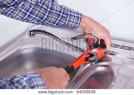 Plumber Fixing Washbasin