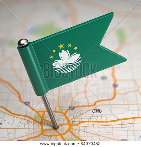 Macau Small Flag on a Map Background.