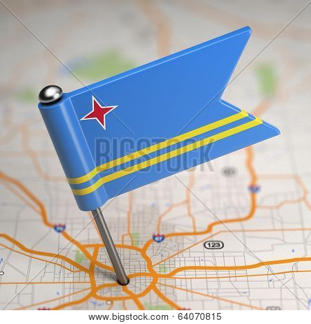 Aruba Small Flag on a Map Background.