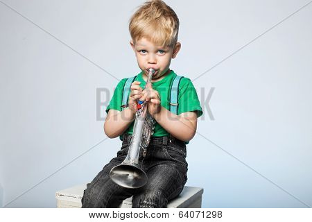 Kid Blowing Trumpet