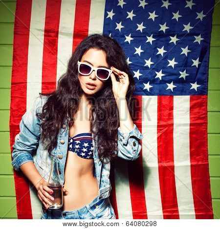 Beautiful Sexy Long Haired Girl Against American Flag