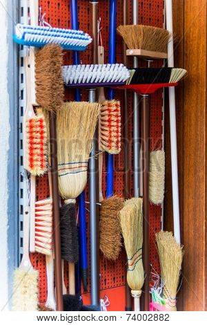 cabinet with various kinds of broom