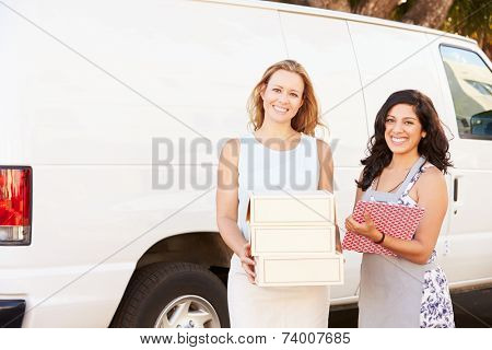 Two Women Running Catering Business With Van