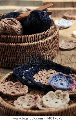 Box Of Yarn And Crocheted Flowers
