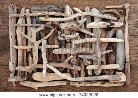Driftwood abstract design on oak wood background.
