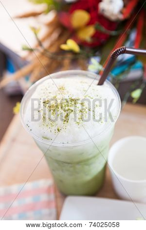 Top View Of Green Tea Bubble Cream In Plastic Glass