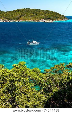 The Island In The Turquoise Sea. White Ship.