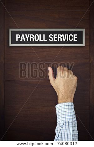 Businessman Is Knocking On Payroll Service Door