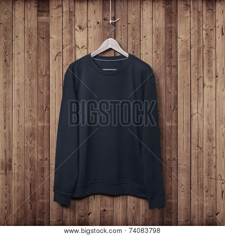 Sweater On A Wood Wall