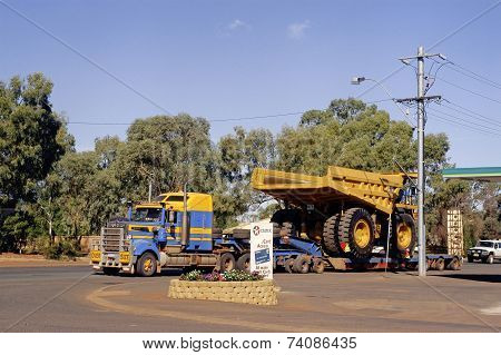 Transporting A Large Dumper Truck On A Road