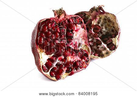 Two Half Of Pomegranate On A White Background