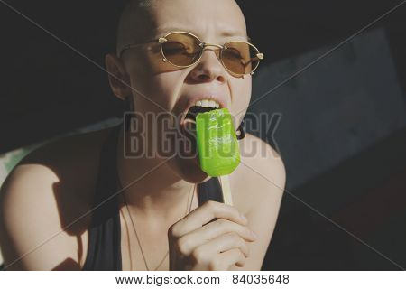 bald woman with ice cream