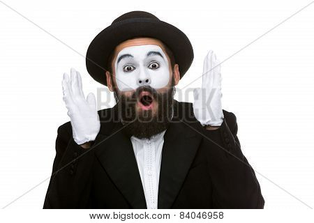 Portrait of the surprised and joyful mime with open mouth