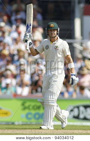 MANCHESTER, ENGLAND - August 01 2013: Michael Clarke raises his bat to acknowledge the crowd after scoring a half century during day one of  the Ashes 3rd test match at Old Trafford Cricket Ground