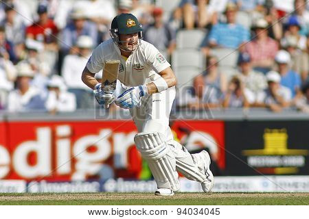 MANCHESTER, ENGLAND - August 01 2013: Michael Clarke runs a single to take him to a century during day one of  the Investec Ashes 3rd test match at Old Trafford Cricket Ground
