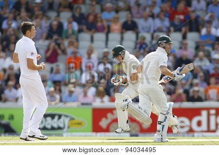 MANCHESTER, ENGLAND - August 02 2013: Steven Smith and Michael Clarke run a single during day one of  the Investec Ashes 3rd test match at Old Trafford Cricket Ground, on August 02, 2013 