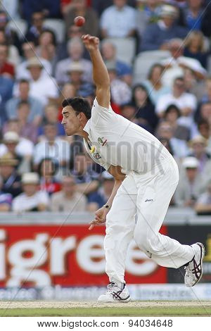 MANCHESTER, ENGLAND - August 03 2013: Mitchell Starc bowling during day three of  the Investec Ashes 3rd test match at Old Trafford Cricket Ground, on August 03, 2013 in London, England.