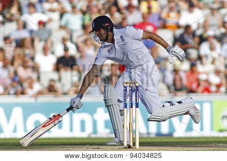 MANCHESTER, ENGLAND - August 02 2013: Alastair Cook runs a single during day two of  the Investec Ashes 3rd test match at Old Trafford Cricket Ground, on August 02, 2013 in London, England.