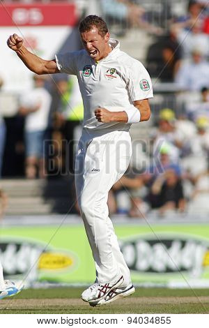 MANCHESTER, ENGLAND - August 02 2013: Peter Siddle celebrates taking the wicket of Joe Root during day two of  the Investec Ashes 3rd test match at Old Trafford Cricket Ground