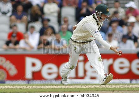 MANCHESTER, ENGLAND - August 03 2013: Steven Smith catches the ball during day three of  the Investec Ashes 3rd test match at Old Trafford Cricket Ground, on August 03, 2013 in London, England.