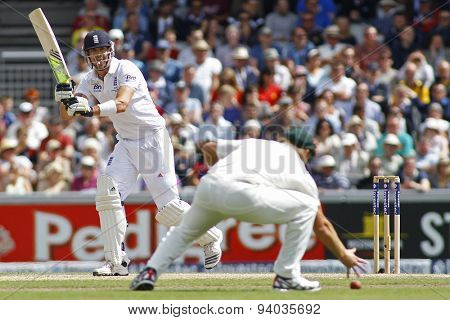 MANCHESTER, ENGLAND - August 03 2013: Kevin Pietersen hits the ball to Shane Watson during day three of  the Investec Ashes 3rd test match at Old Trafford Cricket Ground, on August 03, 2013