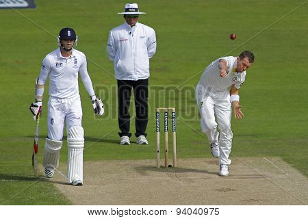 CHESTER LE STREET, ENGLAND - August 10 2013: James Anderson, Aleem Dar and Peter Siddle during day two of the Investec Ashes 4th test match at The Emirates Riverside Stadium, on August 10, 2013