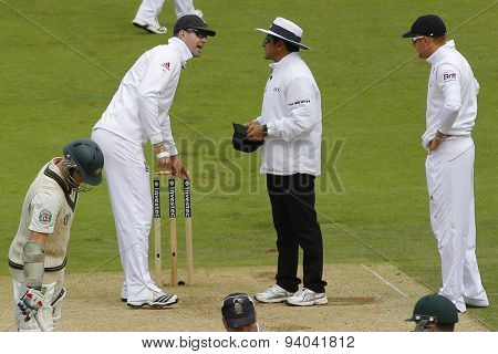 CHESTER LE STREET, ENGLAND - August 10 2013: Kevin Pietersen in discussion with umpire Aleem Dar during day two of the Investec Ashes 4th test match at The Emirates Riverside Stadium