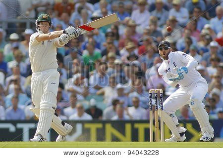 LONDON, ENGLAND - August 21 2013: Steven Smith plays a shot as Matt Prior watches on during day one of the 5th Investec Ashes cricket match between England and Australia 