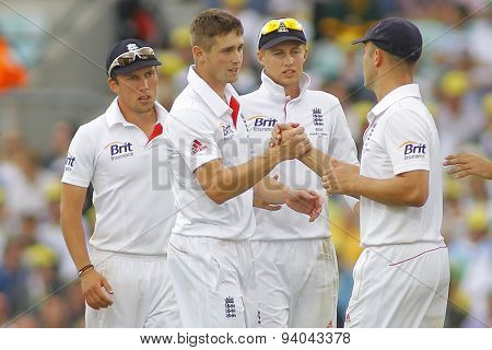 LONDON, ENGLAND - August 22 2013: Chris Woakes shakees hands with Jonathan Trott after Trott caught the ball during day two of the 5th Investec Ashes cricket match between England and Australia