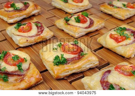 Appetizer Of Puff Pastry With Salami