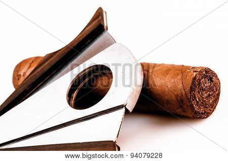 Cigar And Cutter On A White Background
