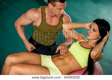 Fitness Youple Workout - Fit Mann And Woman Train In Gym