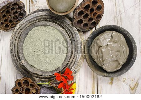 Ancient minerals - green clay powder and mud mask for spa beauty concept