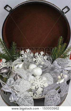 Vintage brown coffer with white Christmas tree decoration copy space