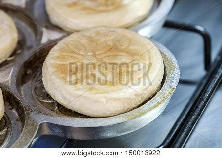 cooking Tigella traditional food from Bologna Modena Emilia Romagna