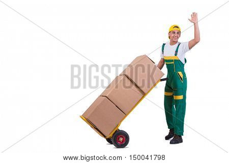 Young man moving boxes with cart isolated on white