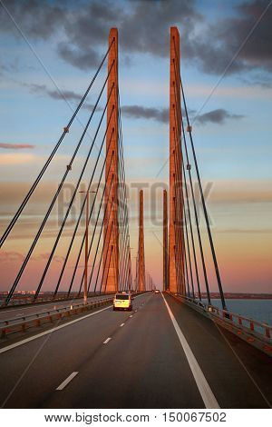 View on Oresund bridge between Sweden and Denmark at sunset