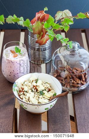 Rustic breakfast set with smoothie, bulgur and nuts