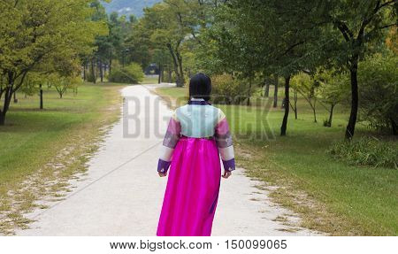 Beautiful girl in Hanbok at Gyeongbokgung, the traditional Korean dress