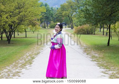 Seoul, South Korea - Sep 26, 2016: Beautiful Korean girl in traditional Hanbok dresses posing at Gyeongbokgung (Gyeongbok) Palace. The palace was the main royal palace of the Joseon dynasty