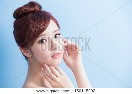 beauty skin care woman smile to you isolated on bluebackground asian