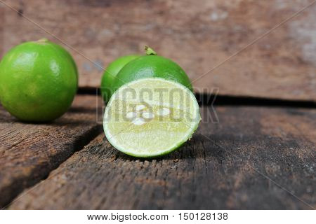 slice lemon closeup Select focus with shallow depth of field on the wooden table