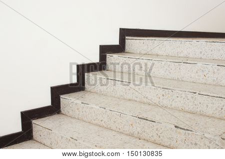Close up Stairs terrazzomarble floor in sideways of a wall