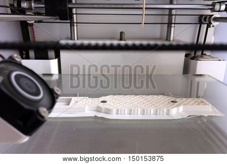 3d printing in progress revealing infill and embedded magnets