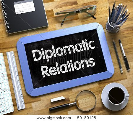 Diplomatic Relations Concept on Small Chalkboard. Diplomatic Relations - Blue Small Chalkboard with Hand Drawn Text and Stationery on Office Desk. Top View. 3d Rendering.