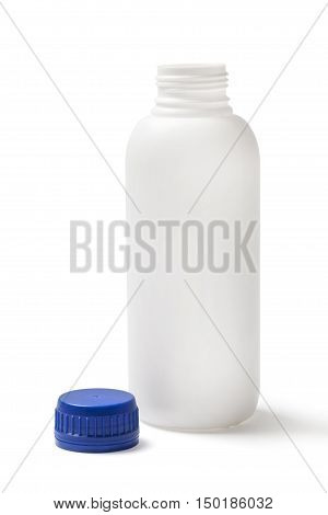Open white plastic bottle with blue cap and clipping path isolated on white background.